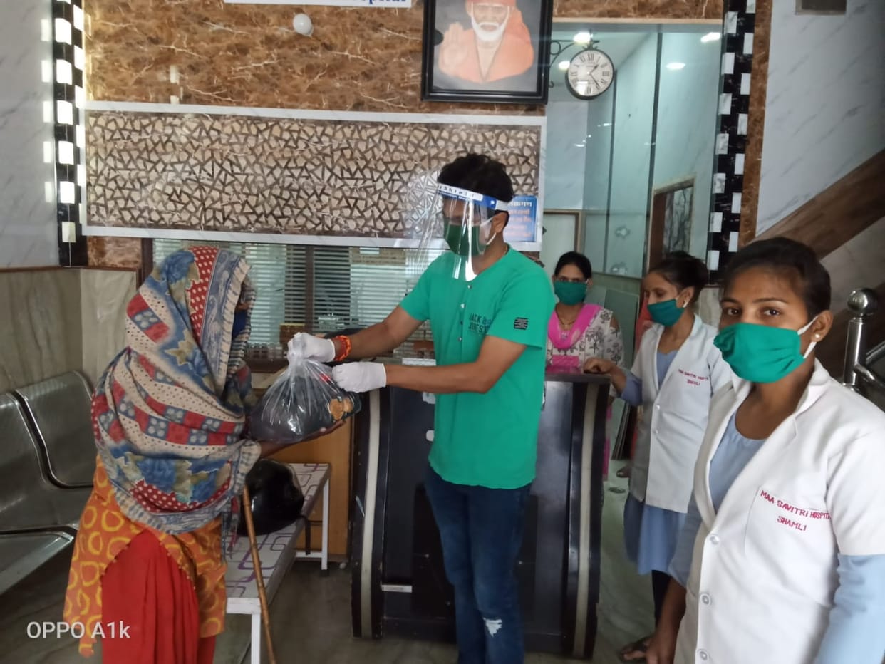 Distribution of ration materials to 18 poor families