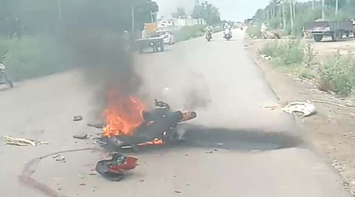 Two injured after being hit by truck, bike set on fire