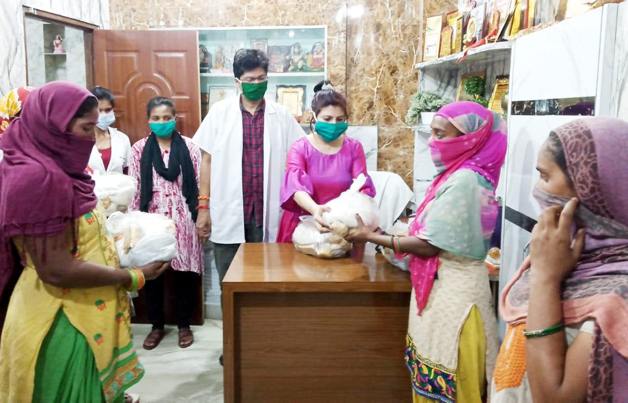 Distribution of food items to 23 poor families