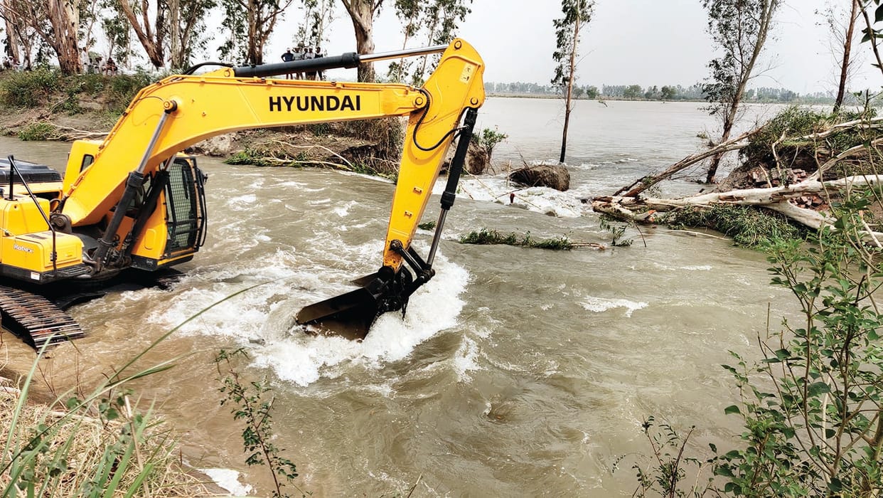 Trees uprooted by strong storm, broken Bhiwani canal near Bharan, several acres of crop were submerged