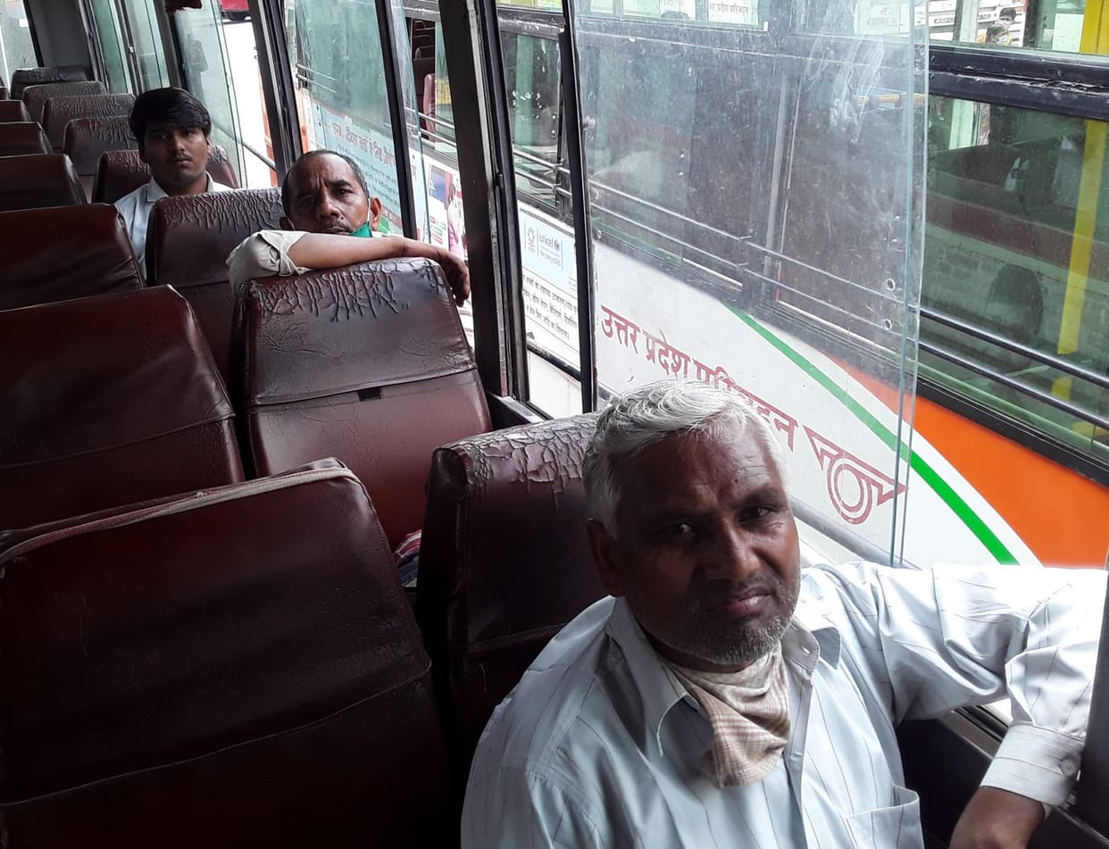 Driver-operators running buses wearing masks, globs