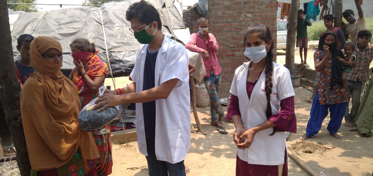 Distribution of ration materials to 20 poor families