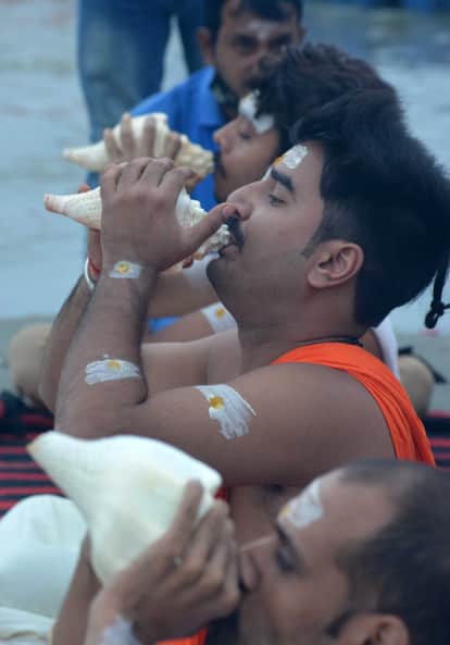 Burning lamp at the confluence, offering to the Sun God