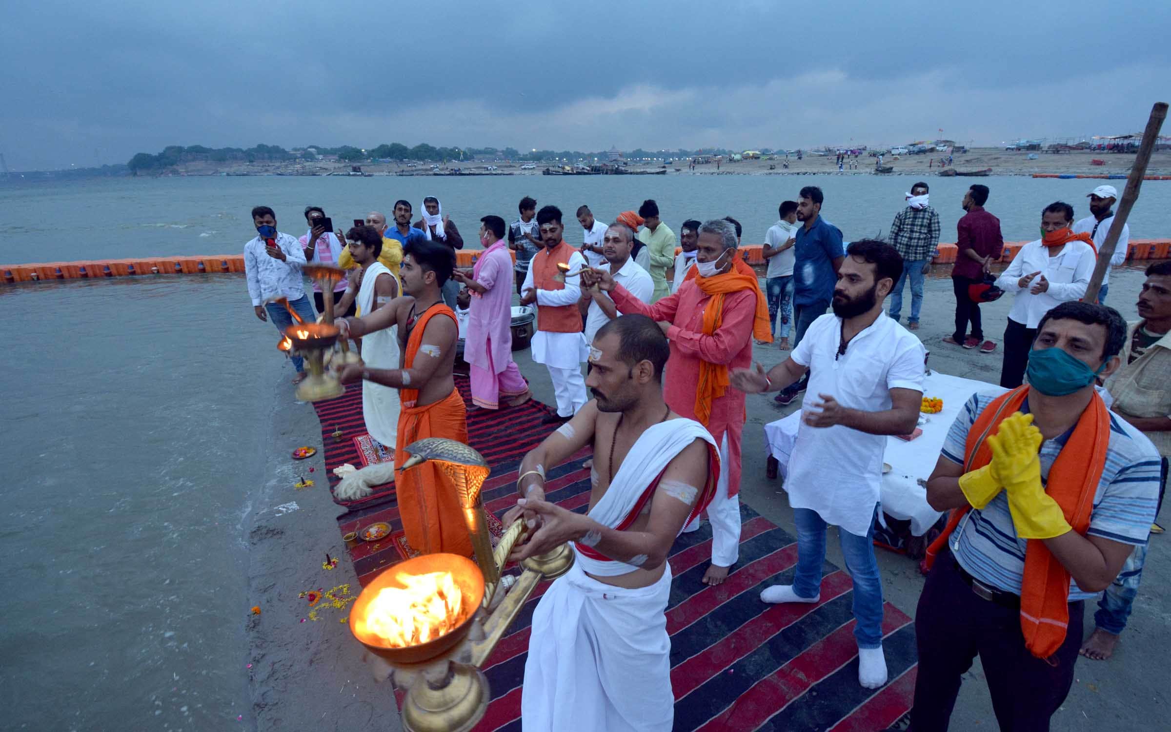 Burning lamp at the confluence, offering to the Sun God