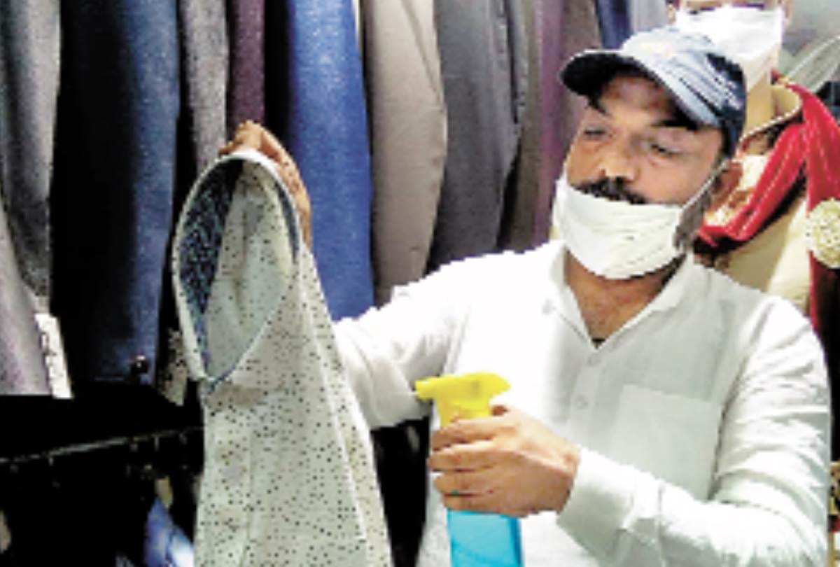 shopkeepers are sanitizing clothes after every trial in lucknow