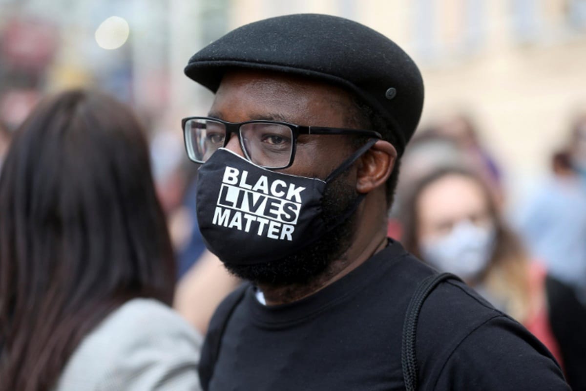 America Peaceful protests against racism protestors gather outside golf resort of donald trump