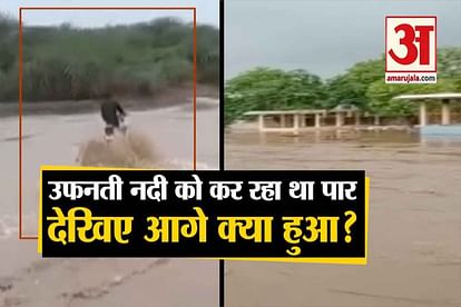 A biker’s bike washed away into flooded water in Gujarat’s Bhavnagar