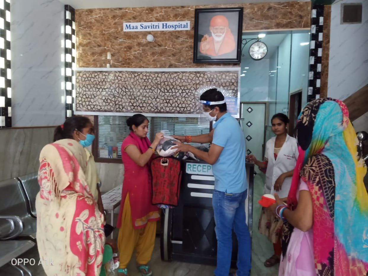 Distribution of food items to 16 poor families