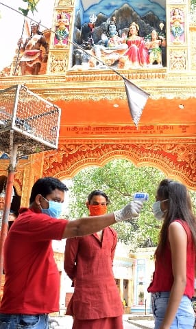Devotees returned from the temple gate with folded hands in fear of Corona