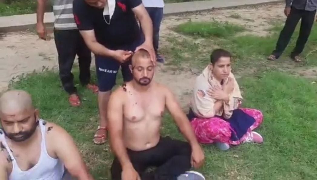 three PTI teachers shaved hair