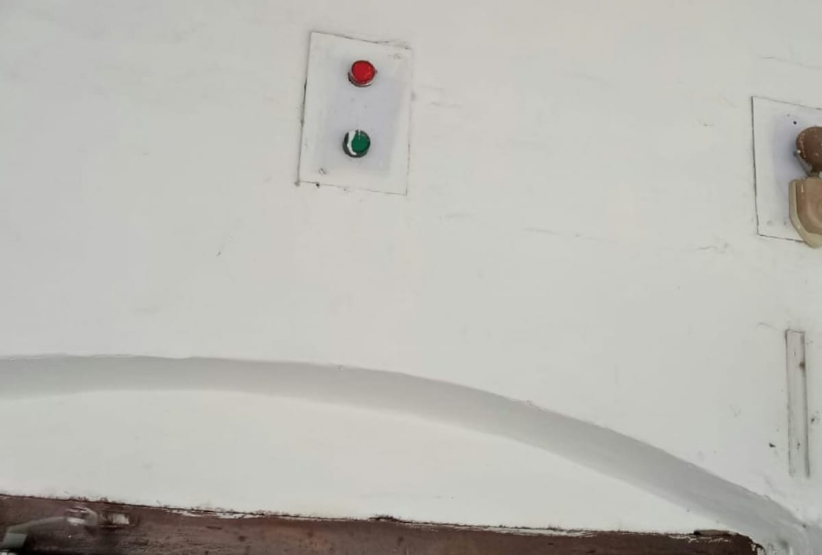 Know about red and green lights are installed outside office of railway