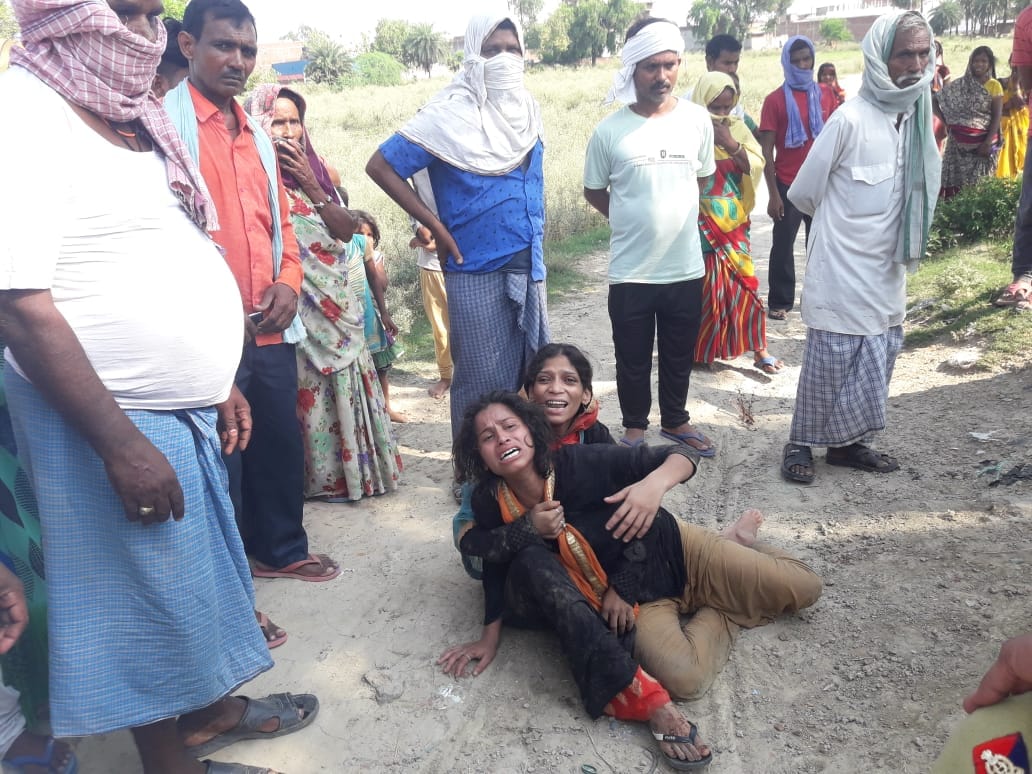 A young man jumped into a puddle in a domestic land dispute