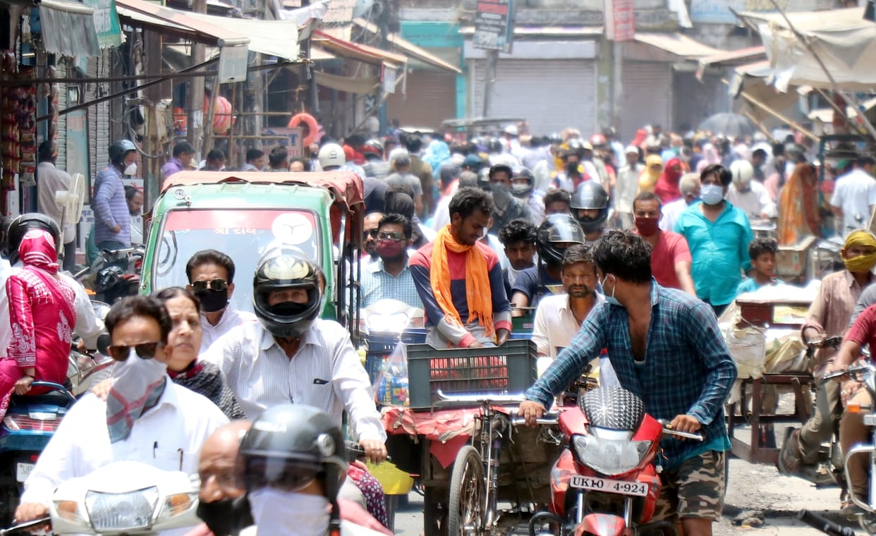 Massive crowd overflowing on banks and roads