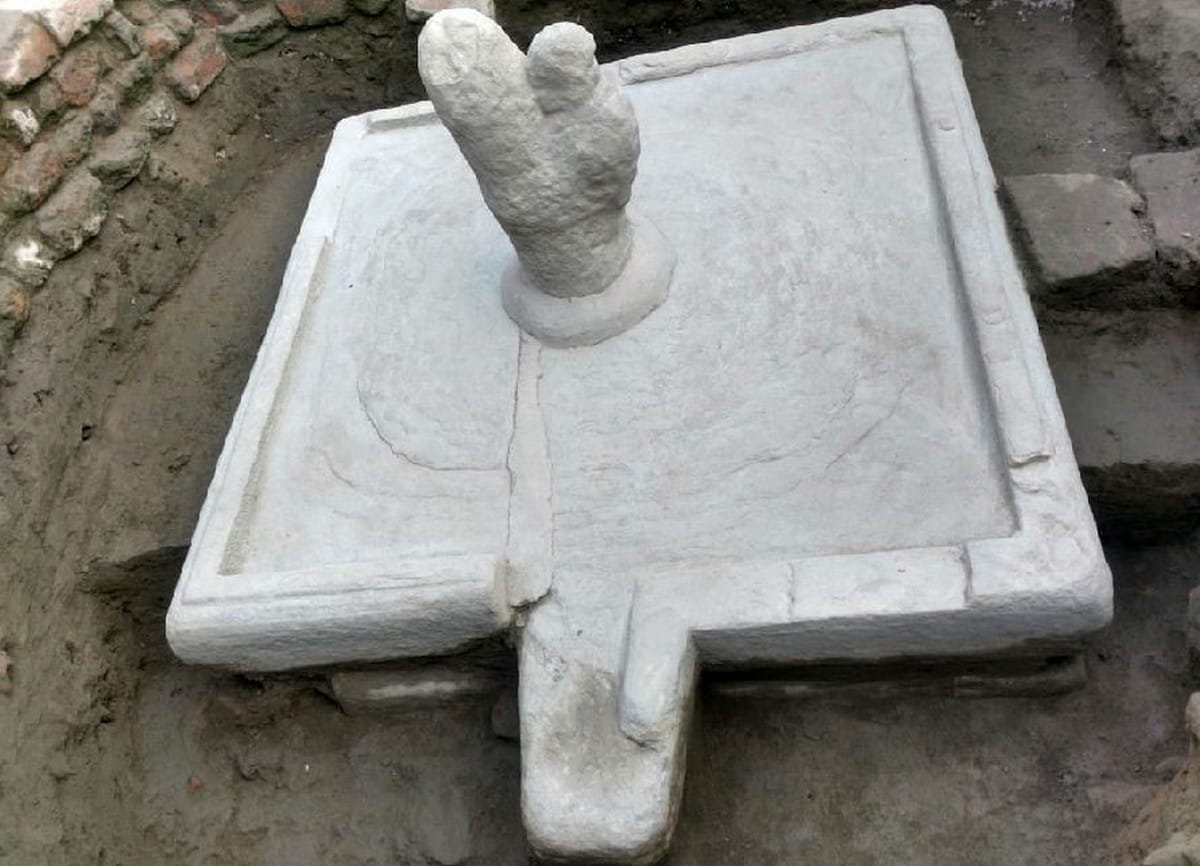 Large stone base found under a Shivling, excavation stopped