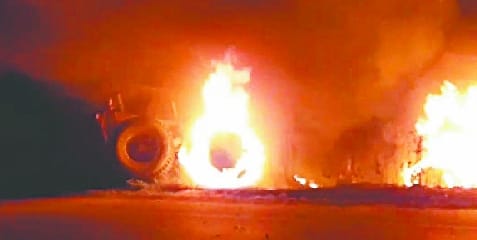 Truck caught fire after hitting electric pole