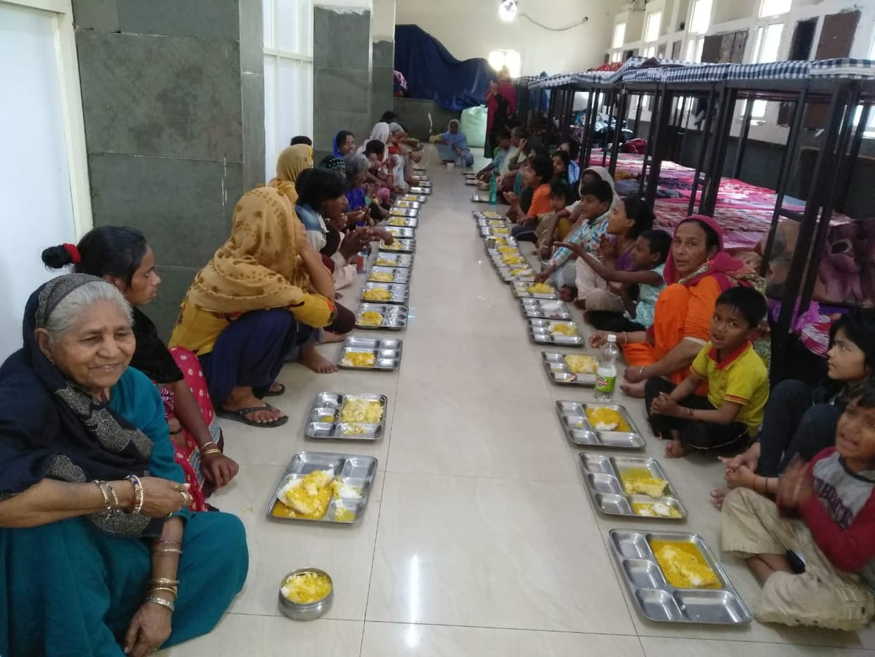 The number of people eating food prepared at relief centers in Delhi decreased, migration and economic activities started