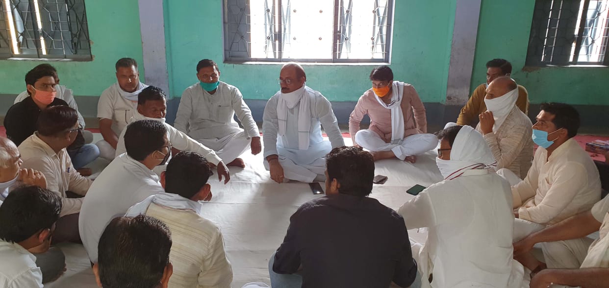 Workers distribute door to door