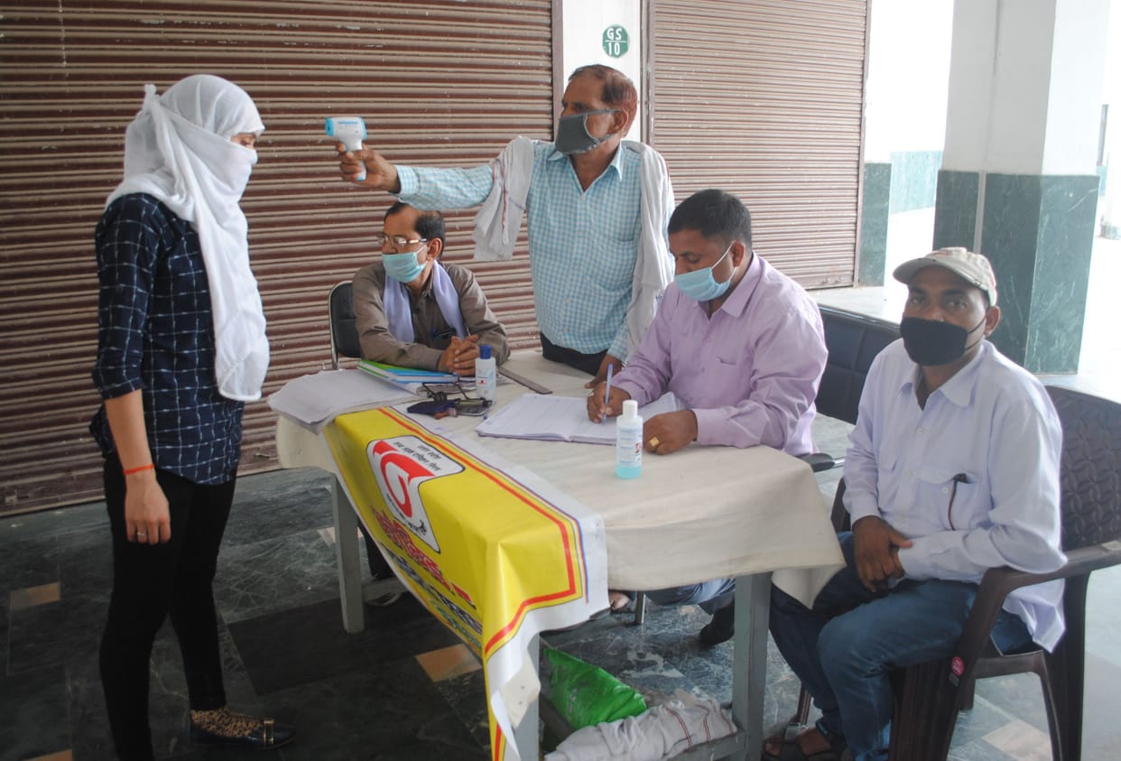 Sensor sanitizer machine installed in bus stand