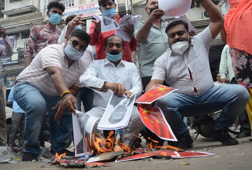 People protest against China in different districts of Uttar Pradesh.
