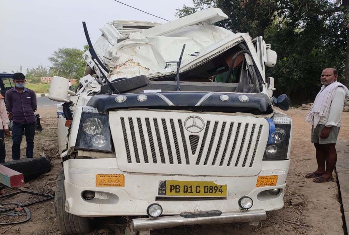 Uncontrolled bus collided with truck after tire burst, one killed, 18 workers injured