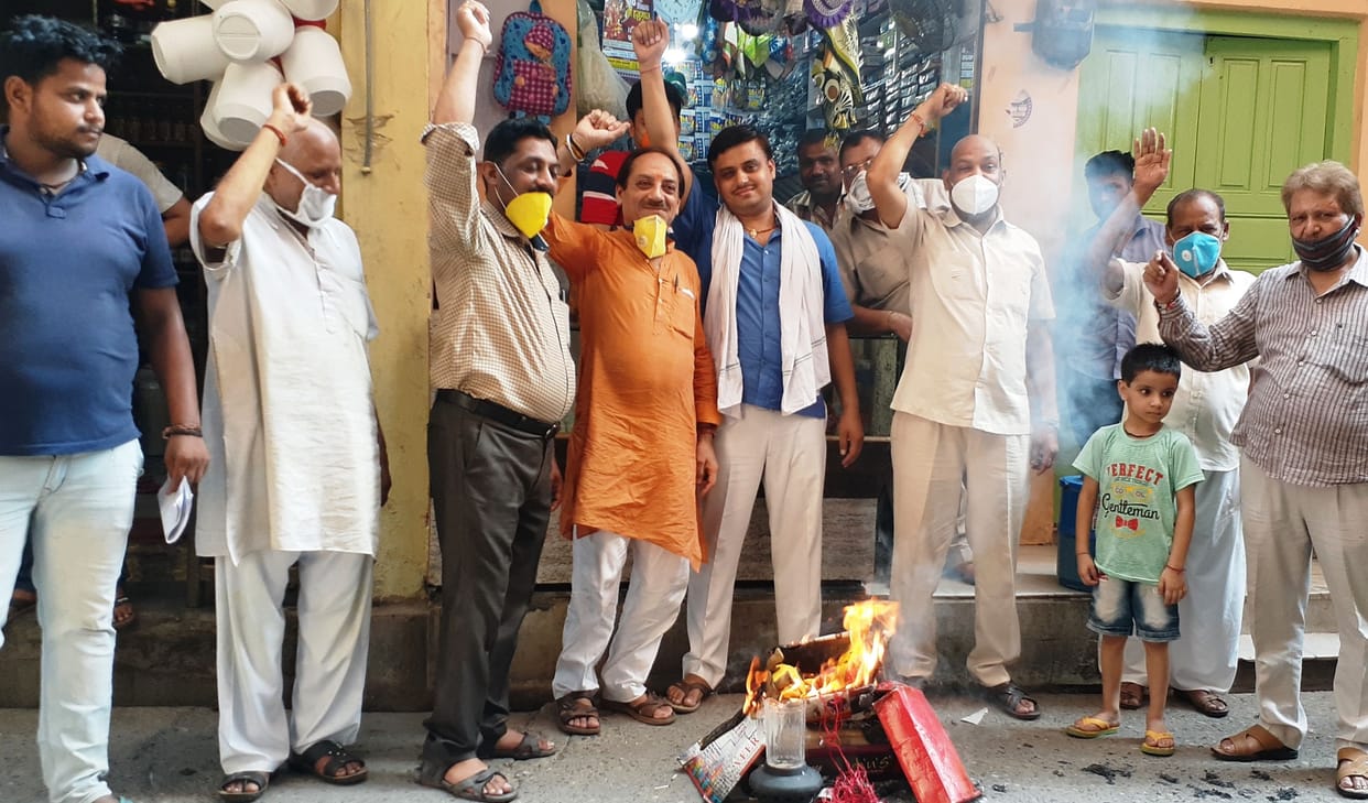 Shopkeepers lit holi of Chinese goods