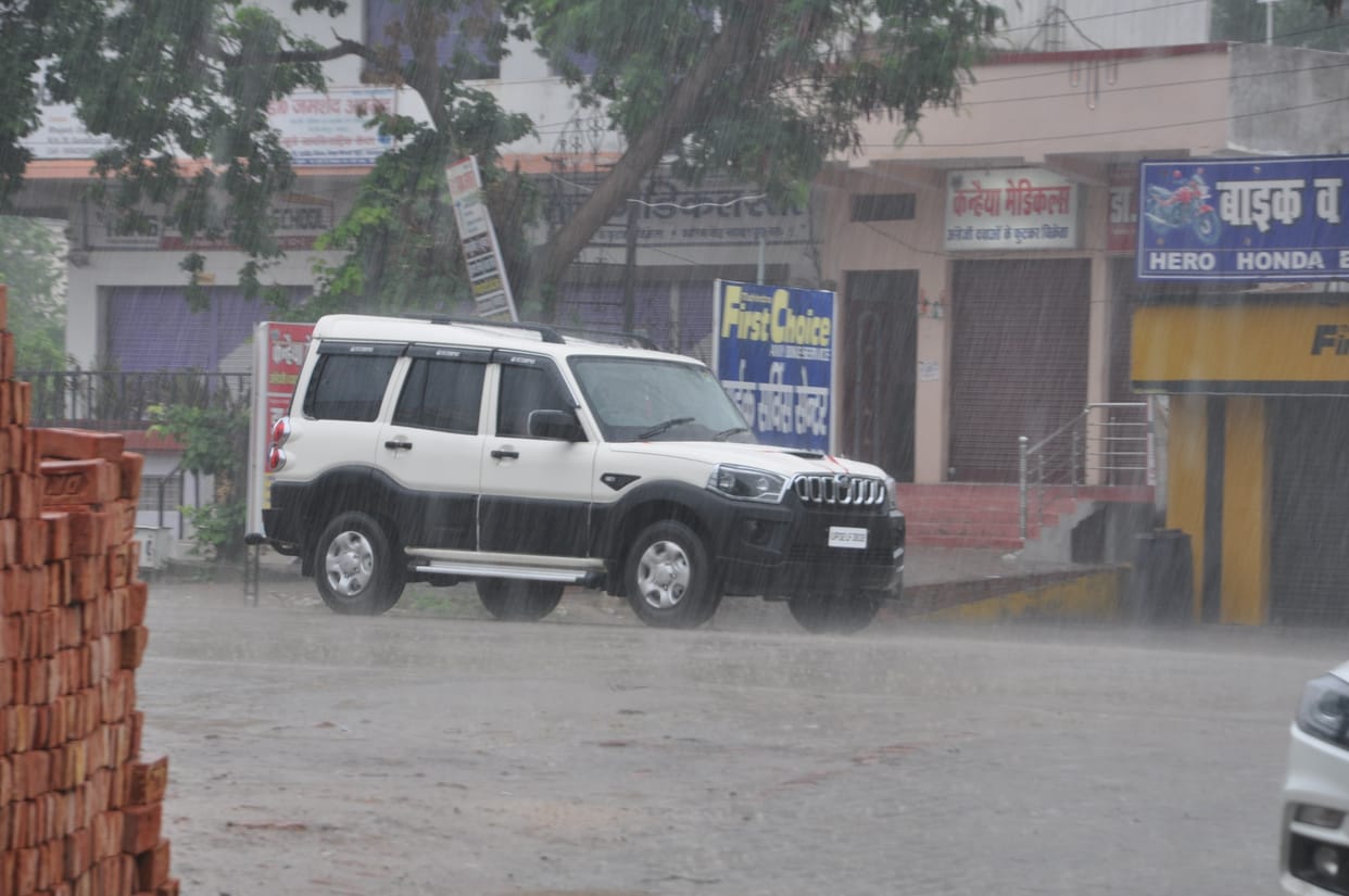 Somewhere there is some light rain, some farmers are engaged in farming