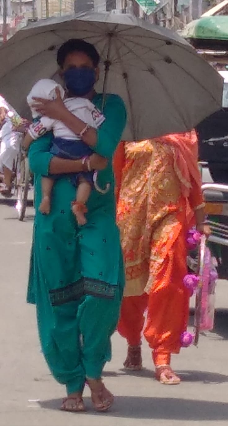 Scorching sun, people suffering from humid