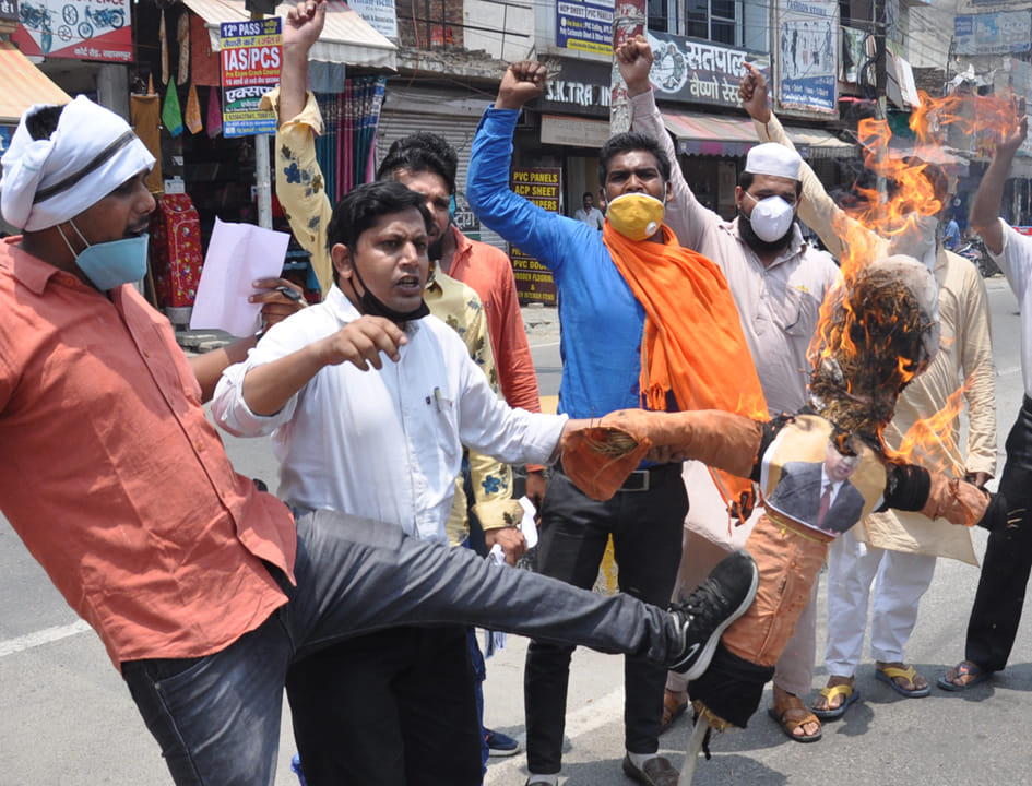 Protest expressed by burning effigy of China