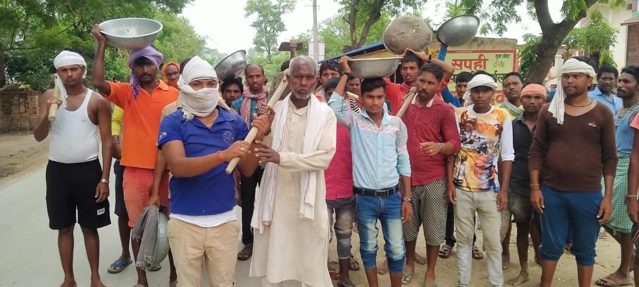 MGNREGA workers demonstrated on pond digging from JCB