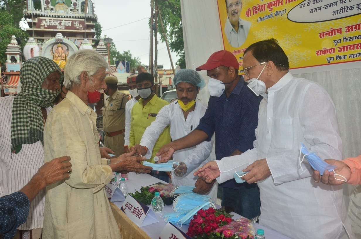 Traders distributed masks and sanitizers to passers-by