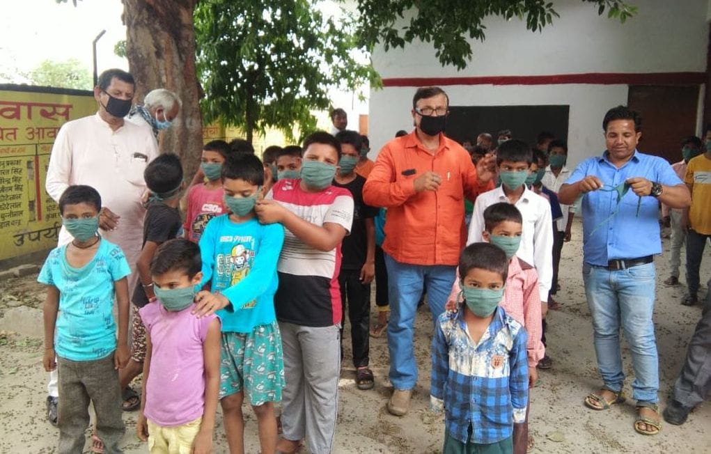 mask distributed in etawah