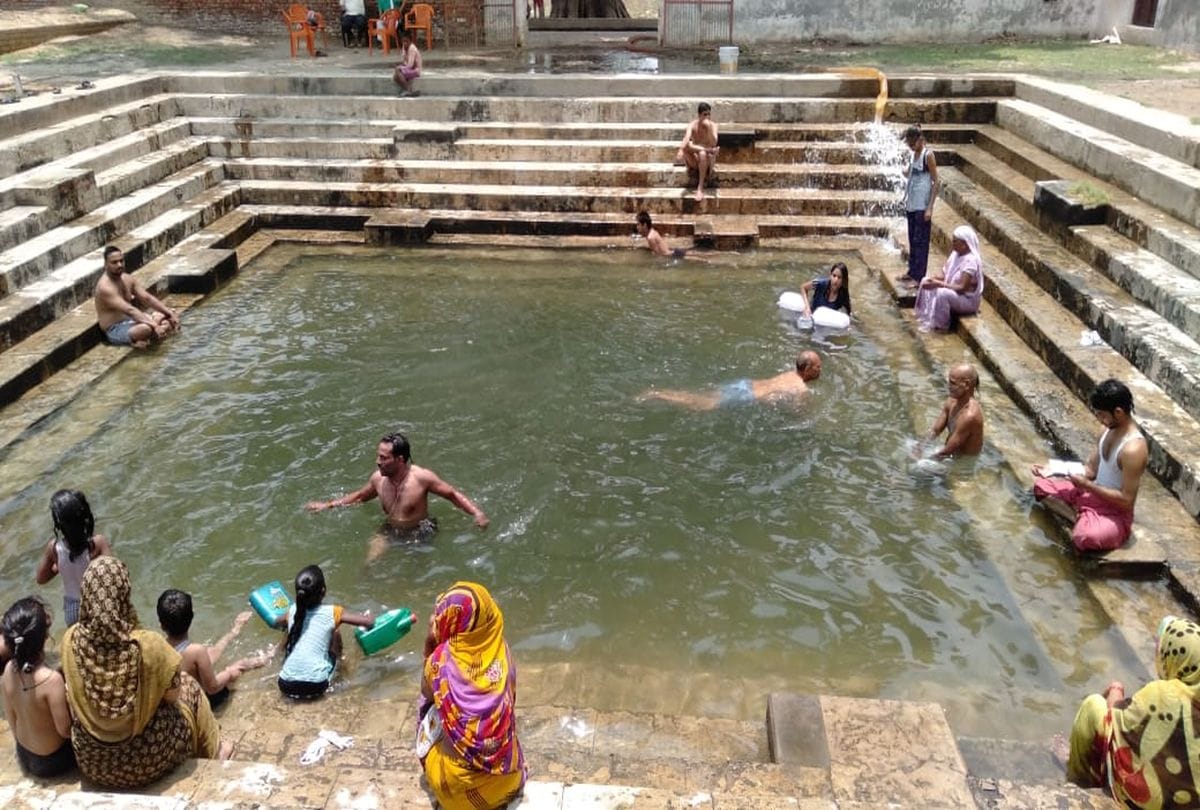 Devotees Take Bath In Surya Kund After Surya Grahan