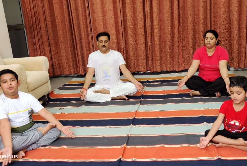 people celebrate international yoga day at their home.