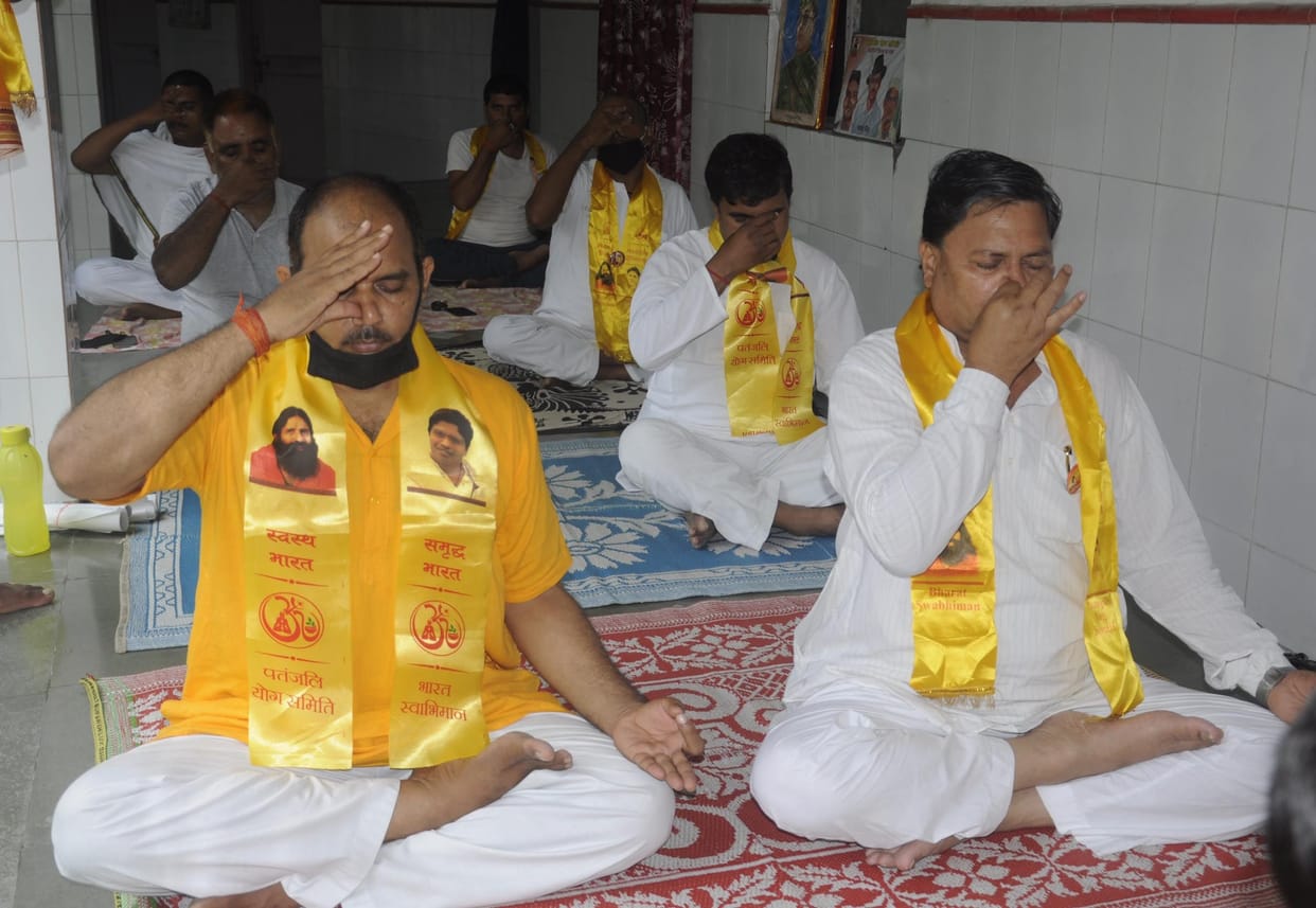 practicing house to house yoga for healthy body