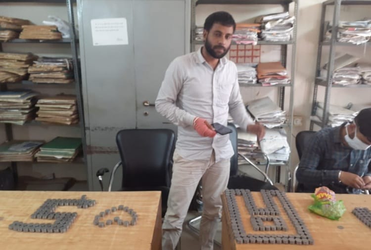 Man Deposit Coins for Property Tax Payment