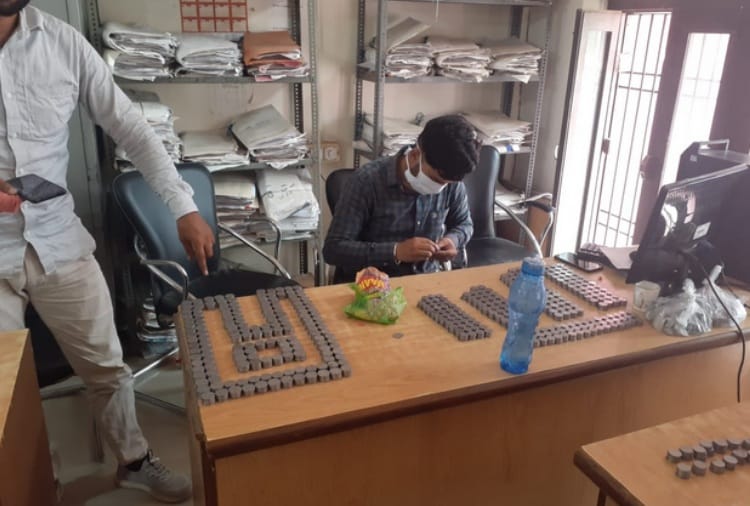 Man Deposit Coins for Property Tax Payment