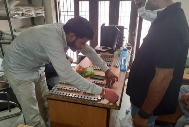 Man Deposit Coins for Property Tax Payment