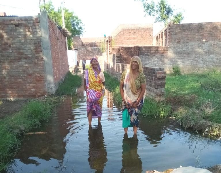 The street closed due to water logging, people are worried