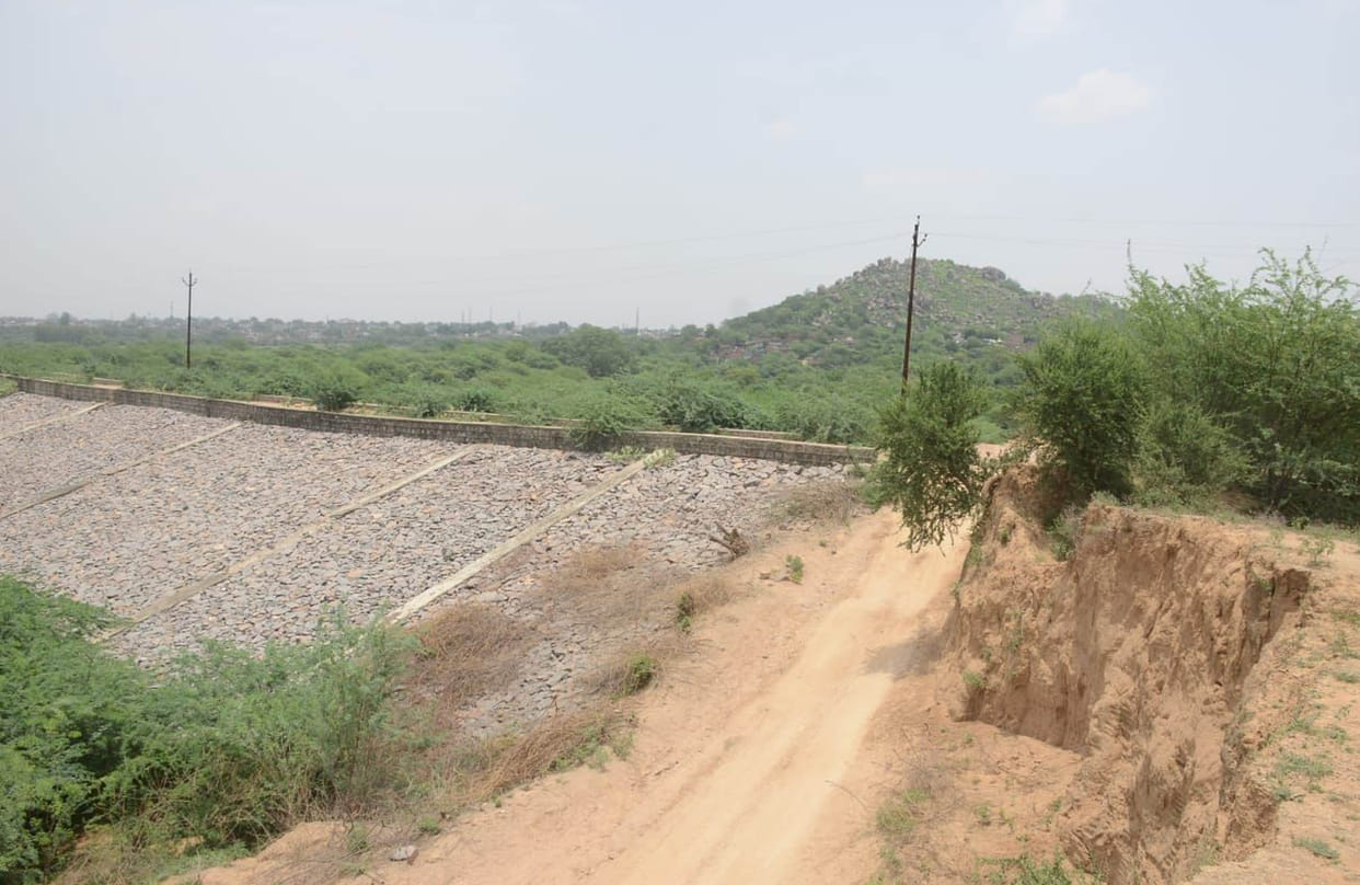Pump house not built in embankment of Cane River