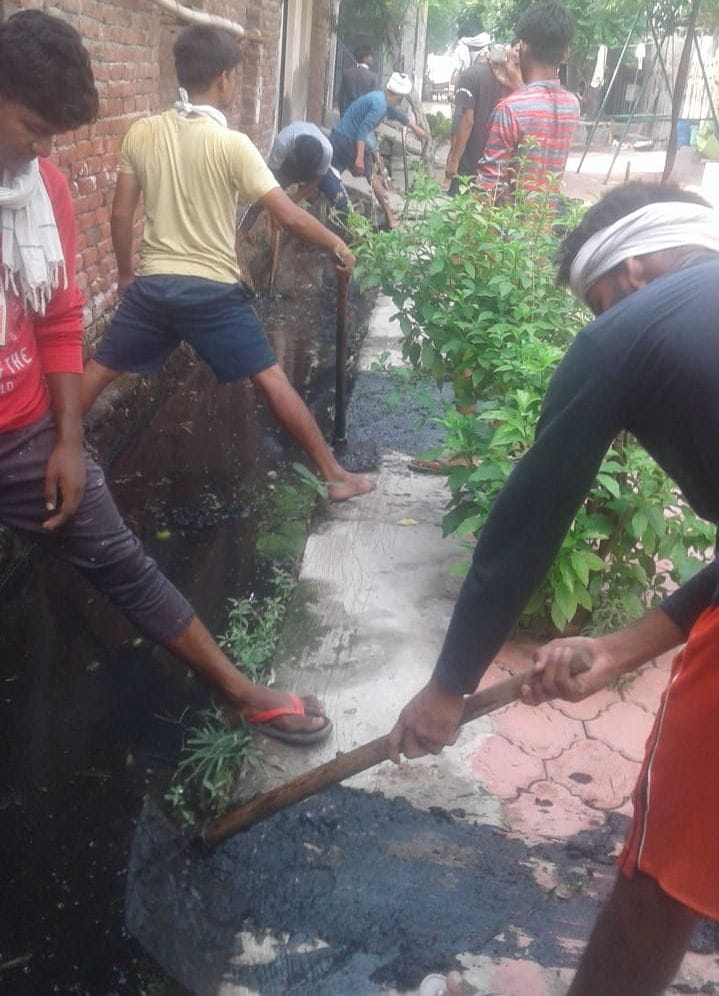 Cleaning of drains in Gandhi Colony