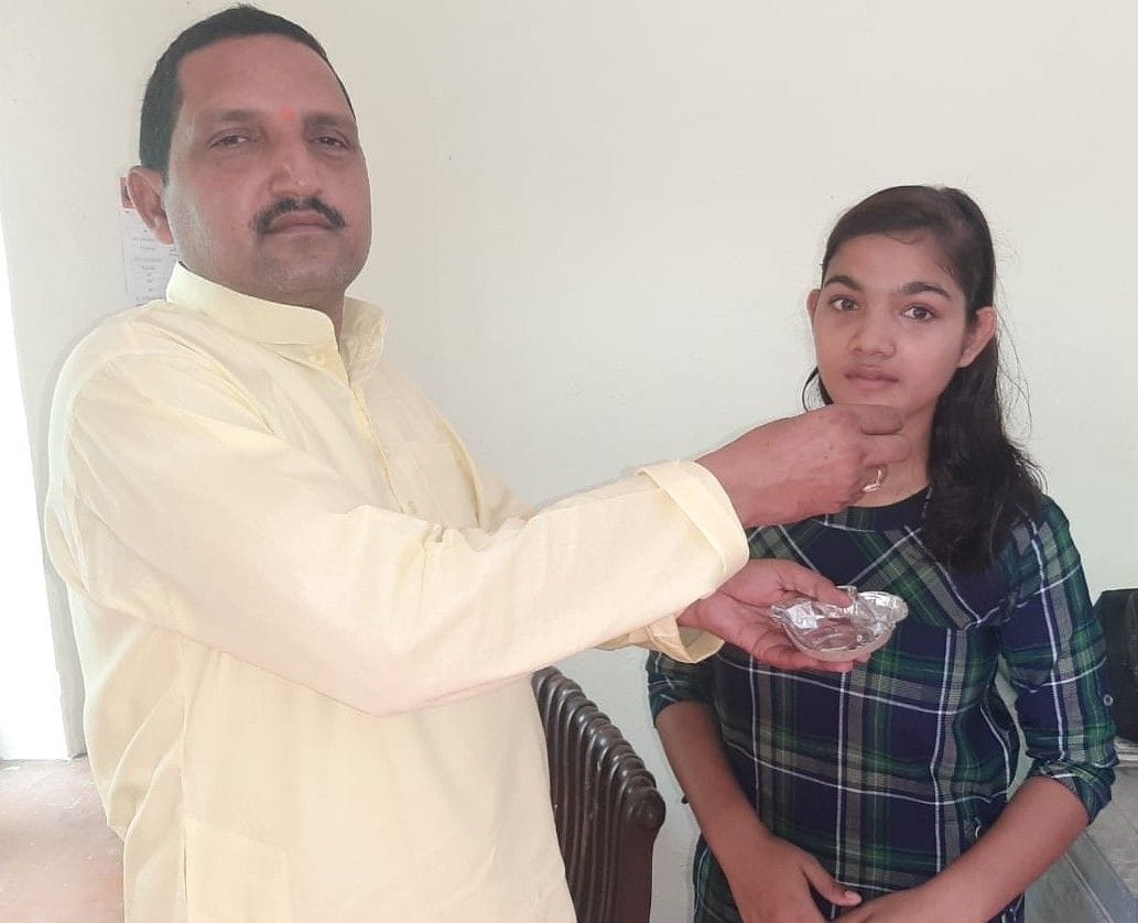 Neha in intermediate and Nandini district topper in high school