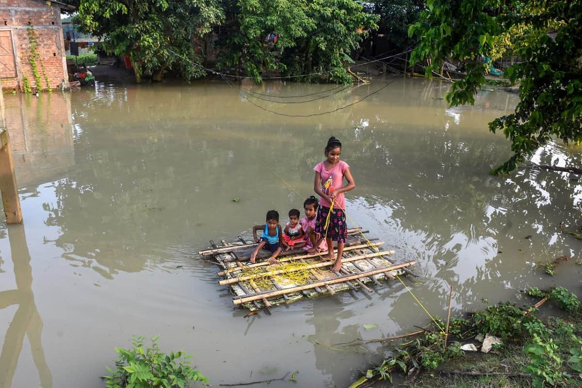 Assam flood worsens with two more people dead more than 9 lakh people hit images