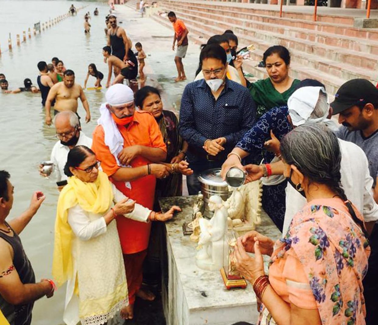 Devotees swam in mass Sai bath