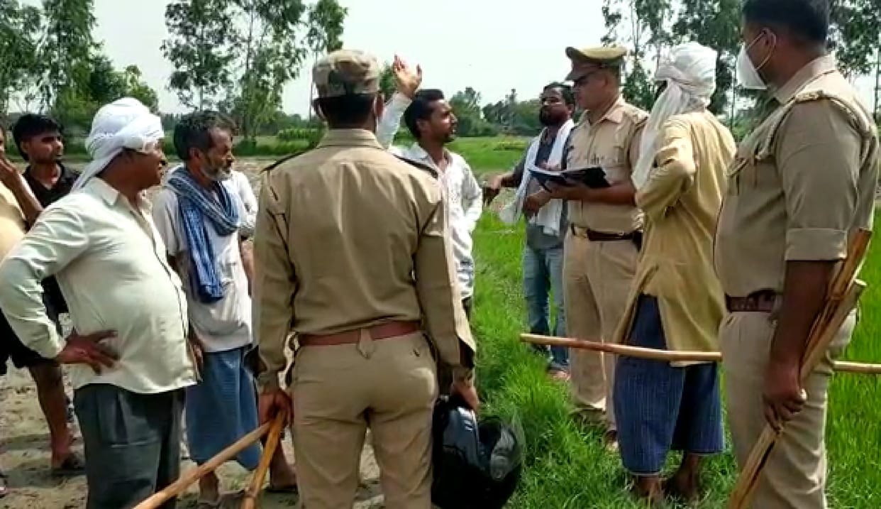 Two sides dispute, firing, three injured in ground dispute