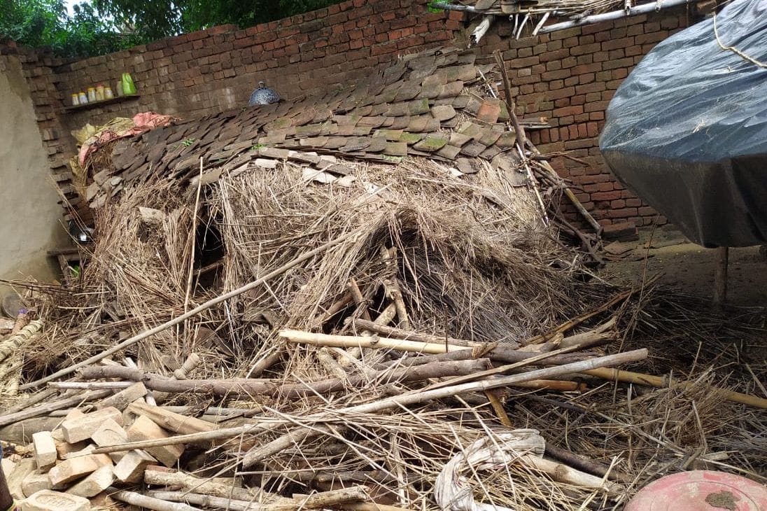 a building demolished by rain and a lady died