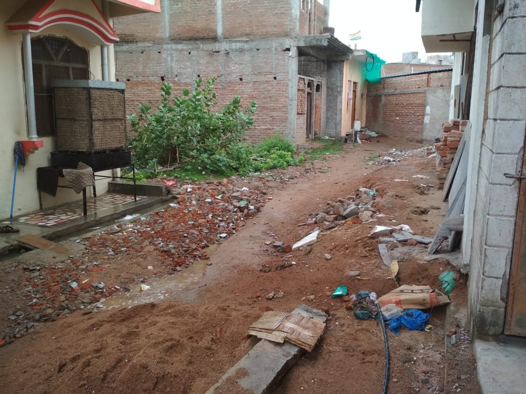 water gathering on shabby roads