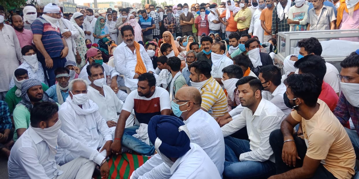 Protest by placing dead bodies on the road