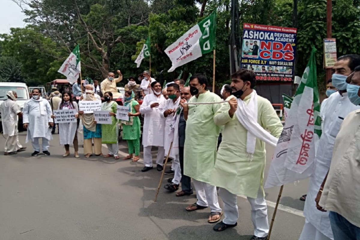 RLD activists protest against increase prices of petrol and diesel in Meerut