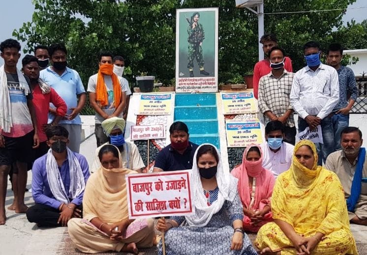 Resolve land issue in Bazpur