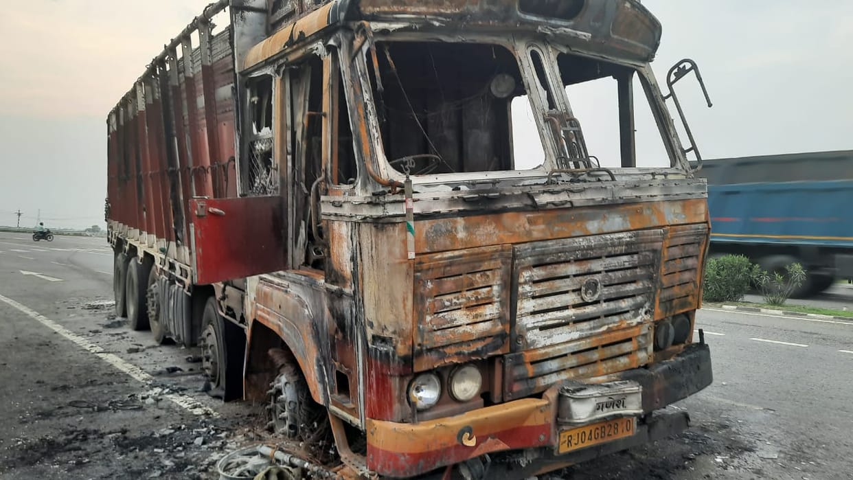 The bike stuck in the truck in the accident, the truck and bike burned with spark